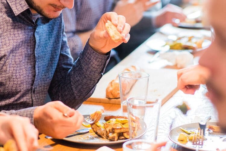 Person eating at a restaurant