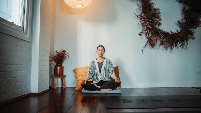 Professional mindfulness teacher guiding a meditation session