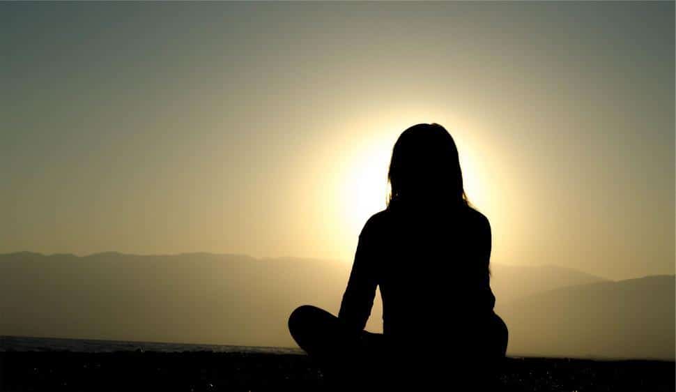silhouette-of-a-person-meditating-during-sunset mindfulness exercises, Mindfulness Exercises – Free Meditations for Mindfulness Exercises and Guided Meditations